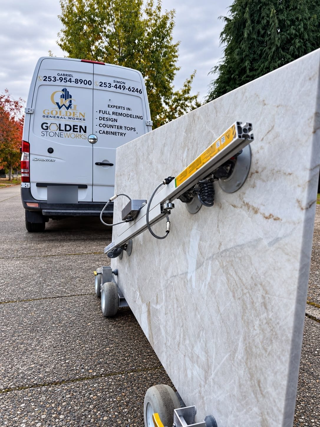 Golden General Works van delivering a quartzite slab on a vacuum cart